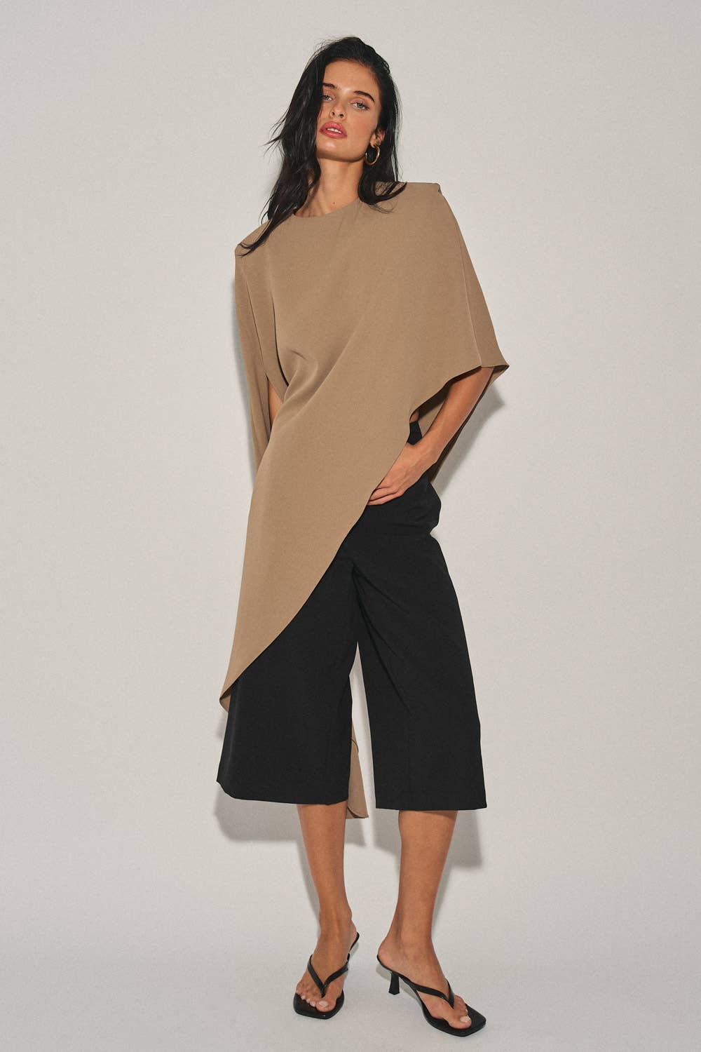 M0037T LADIES WOVEN OVERSIZED ASYMMETRICAL CAPE TOP: DK Taupe / M