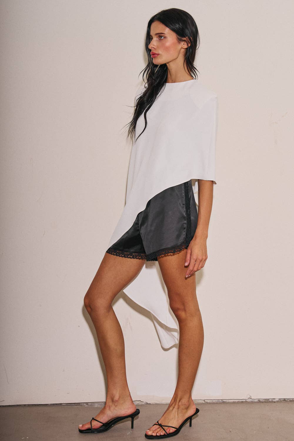 M0037T LADIES WOVEN OVERSIZED ASYMMETRICAL CAPE TOP: DK Taupe / M