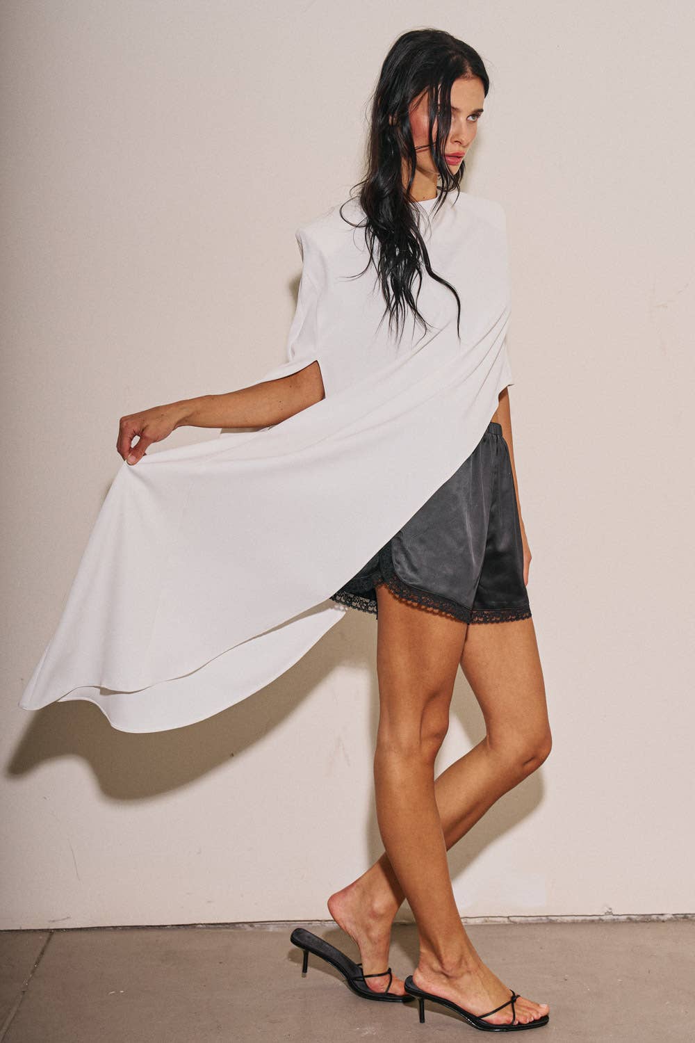 M0037T LADIES WOVEN OVERSIZED ASYMMETRICAL CAPE TOP: DK Taupe / M